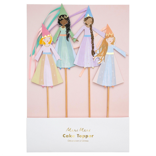 Set of four princess cake toppers on sticks with colorful dresses and crowns, branded 'Meri Meri'.