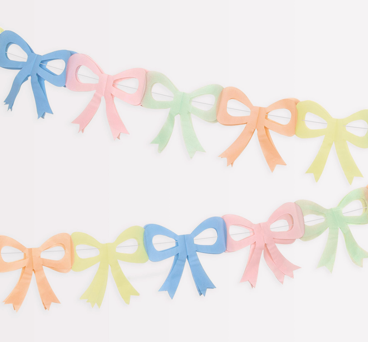 Pastel-colored bow-shaped decorations on a white background